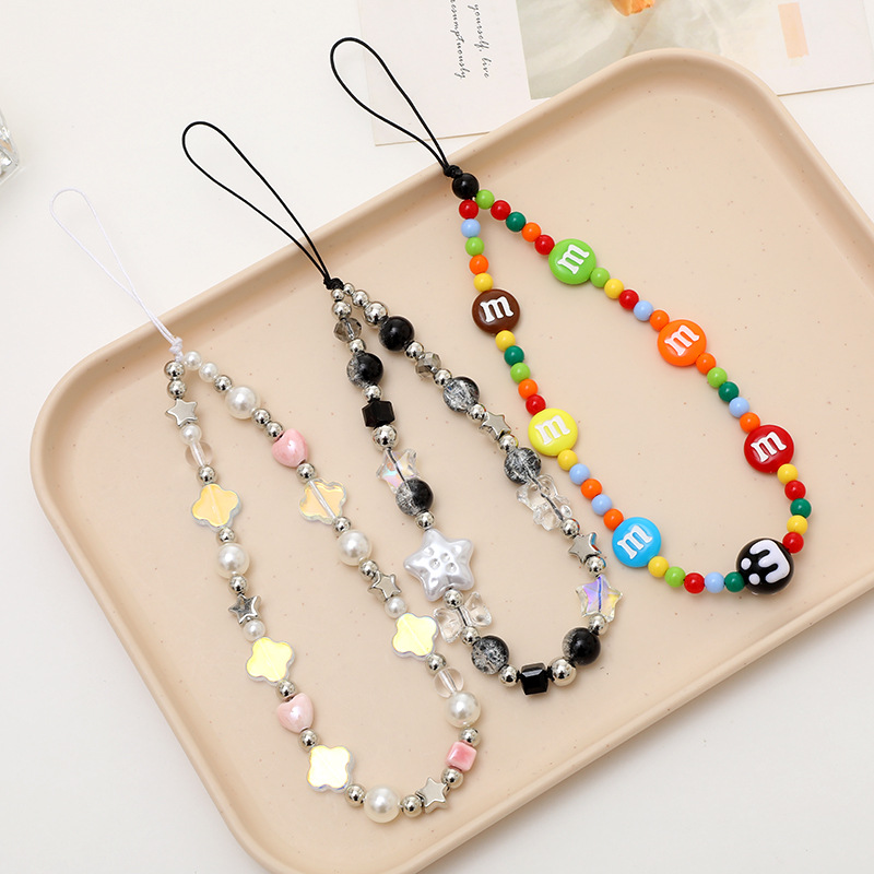 Fashion Women Picture - เคสโทรศัพท์ลายดอกไม้มุกสุดฮิต พร้อมสายคล้องคอแบบเรียบง่าย ตกแต่งด้วยฟักทองฮาโลวีน กะโหลก และลูกปัด สำหรับผู้หญิง